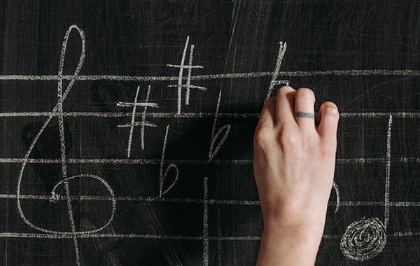 writing music on chalk board